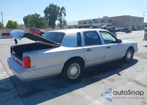 1997 Lincoln Town Car Cartier z USA, uszkodzony, nr VIN 1LNLM83W3VY744356